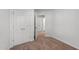 Bedroom featuring double closets for ample storage with neutral carpet and paint at 101 Wimbledon Ct, Clayton, NC 27520