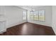 Dining room featuring hardwood floors, a chandelier, and lots of natural light at 101 Wimbledon Ct, Clayton, NC 27520
