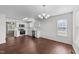Bright kitchen featuring stainless steel appliances, solid surface counters, and luxury vinyl plank flooring at 101 Wimbledon Ct, Clayton, NC 27520