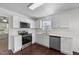 Updated kitchen with stainless steel appliances, modern cabinetry and sleek countertops, bathed in light at 101 Wimbledon Ct, Clayton, NC 27520