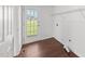 A well-lit laundry room features a door to the exterior and utility connections at 101 Wimbledon Ct, Clayton, NC 27520