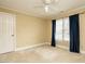 Bedroom with a ceiling fan, neutral paint, and natural light at 103 Glenstone Ln, Cary, NC 27518