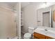Bathroom featuring a glass door shower, toilet and sink at 104 Chris Ct, Cary, NC 27511