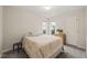 Cozy bedroom with a comfortable bed, soft colors, and natural light at 104 Chris Ct, Cary, NC 27511