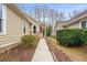 Charming home exterior with a walkway leading to the entrance at 104 Chris Ct, Cary, NC 27511