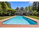 View of backyard with swimming pool, and backyard at 109 Chimeneas Pl, Chapel Hill, NC 27517