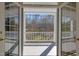 Charming balcony with white railings, offering scenic views of the surrounding landscape at 109 Chimeneas Pl, Chapel Hill, NC 27517