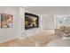 Home theater in basement, showcasing a large screen and comfortable seating at 109 Chimeneas Pl, Chapel Hill, NC 27517