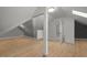 Finished basement with laminate flooring and open layout offers versatile living space for various activities at 109 Chimeneas Pl, Chapel Hill, NC 27517