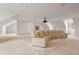 Finished basement area featuring a large sectional couch and projector screen, perfect for entertainment at 109 Chimeneas Pl, Chapel Hill, NC 27517