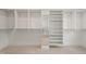 Spacious walk-in closet with custom shelving and ample storage for organization at 109 Chimeneas Pl, Chapel Hill, NC 27517