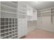 Spacious walk-in closet with custom shelving and storage solutions at 109 Chimeneas Pl, Chapel Hill, NC 27517