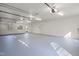 Large, painted three car garage with windows and doors at 109 Chimeneas Pl, Chapel Hill, NC 27517