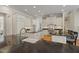 Spacious kitchen featuring black granite countertops and white cabinetry at 109 Chimeneas Pl, Chapel Hill, NC 27517