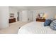Spacious main bedroom with soft carpet, wooden furniture and light decor at 109 Chimeneas Pl, Chapel Hill, NC 27517