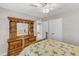 Bedroom with natural light, ceiling fan and wooden furniture at 110 Gulley Glen Dr, Garner, NC 27529