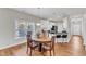 Dining area with pendant lighting and views of kitchen and yard at 110 Gulley Glen Dr, Garner, NC 27529