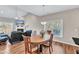 Cozy dining room and sitting area boasts lots of natural light at 110 Gulley Glen Dr, Garner, NC 27529