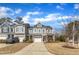 Well-maintained townhomes with manicured lawns, and inviting front porches, in a Gathering-friendly community at 110 Gulley Glen Dr, Garner, NC 27529