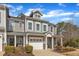 Charming townhome featuring a two-car garage and inviting front porch at 110 Gulley Glen Dr, Garner, NC 27529