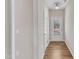 Hallway with natural light coming through glass on front door at 110 Gulley Glen Dr, Garner, NC 27529