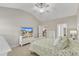 Bright main bedroom featuring a vaulted ceiling, plush carpet, and crisp white furniture at 110 Gulley Glen Dr, Garner, NC 27529