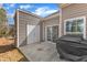 View of patio with double doors and a window at 110 Gulley Glen Dr, Garner, NC 27529
