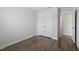 Bedroom with hardwood floors, neutral walls and large closet at 111 Hickory Plains Rd, Knightdale, NC 27545