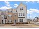 Attractive three-story townhome with neutral siding and brick accents, in a desirable neighborhood at 111 Hickory Plains Rd, Knightdale, NC 27545