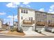 Stylish townhomes with attached garages, a private balcony, and beautifully landscaped grounds at 111 Hickory Plains Rd, Knightdale, NC 27545