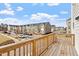 Townhome community view from balcony featuring street view, sidewalk and manicured landscaping at 111 Hickory Plains Rd, Knightdale, NC 27545