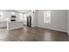 Bright kitchen with white cabinets, stainless steel appliances, and an island at 111 Hickory Plains Rd, Knightdale, NC 27545