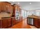 Spacious kitchen with stainless steel appliances, granite countertops, and custom cabinetry at 11342 Oakcroft Dr, Raleigh, NC 27614