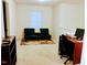Home office featuring a dark futon, dark desk, and dark shelving unit at 1141 Early Rise St, Raleigh, NC 27610
