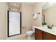 Bathroom with tiled floors, toilet, vanity, and a glass door shower at 121 Stone Nut Trl, Fuquay Varina, NC 27526