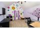 Playful bedroom with vaulted ceiling, circle decorations, and carpeted floors at 121 Stone Nut Trl, Fuquay Varina, NC 27526