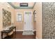 Welcoming foyer with wood floors, decorative lighting, and stylish accents at 121 Stone Nut Trl, Fuquay Varina, NC 27526