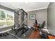 Home gym including squat rack, weights and work from home set up at 121 Stone Nut Trl, Fuquay Varina, NC 27526