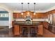 Gourmet kitchen features a large island, stainless steel appliances, and ample cabinetry at 121 Stone Nut Trl, Fuquay Varina, NC 27526