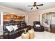 Open-concept living room flows seamlessly into the kitchen with a beautiful staircase at 121 Stone Nut Trl, Fuquay Varina, NC 27526