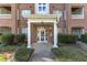 Brick building with white door and columns in front of entrance 1700 at 1700 Tiffany Bay Ct # 303, Raleigh, NC 27609
