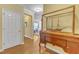 Hallway with beautiful wooden display case and lovely doors and trim and shiny floors at 1700 Tiffany Bay Ct # 303, Raleigh, NC 27609