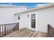 Covered back deck, perfect for enjoying outdoor living and entertaining with access to back yard at 174 Arrow Ln, Middlesex, NC 27557