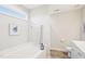 Bathroom featuring a soaking tub with an adjacent toilet at 174 Arrow Ln, Middlesex, NC 27557