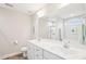 Bright bathroom with double sinks, modern fixtures, and framed mirror at 174 Arrow Ln, Middlesex, NC 27557