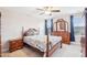 Bright bedroom featuring a traditional style bed set, with natural lighting from a window at 174 Arrow Ln, Middlesex, NC 27557