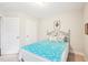 Bedroom with bed, bedside table, and wall art providing a cozy atmosphere at 174 Arrow Ln, Middlesex, NC 27557