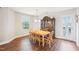 Traditional dining area featuring wood table and chairs next to hutch at 174 Arrow Ln, Middlesex, NC 27557