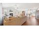 Open-concept living space with modern fireplace, dining area, and kitchen at 174 Arrow Ln, Middlesex, NC 27557