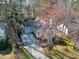 Charming home with mature landscaping, a long driveway, and a covered front porch at 1821 Kelly Glen Dr, Apex, NC 27502